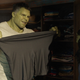 Bruce showing Jen her best friend, spandex.